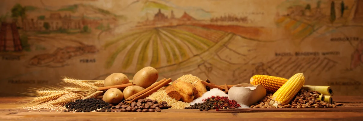 Imagem realista com batatas, trigo, milho, café, pimentas, cana-de-açúcar e especiarias sobre mesa rústica, representando alimentos históricos que moldaram civilizações.